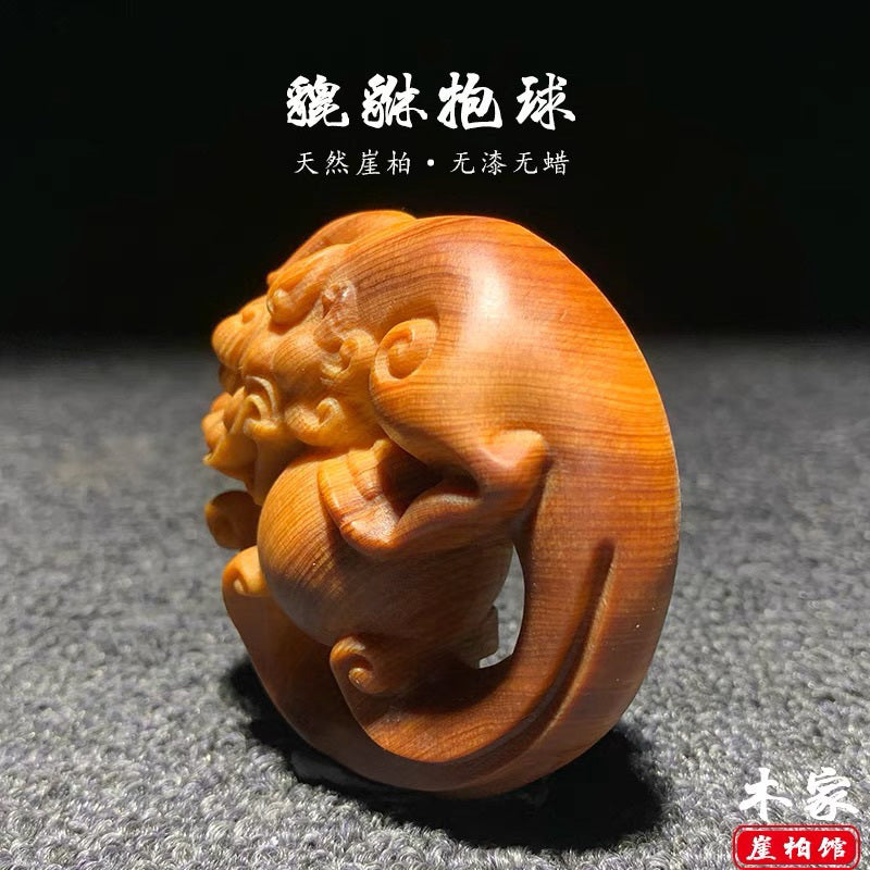 Thuja wood high oil aged material carved Pixiu holding a ball table for portable play and hand-held home decoration