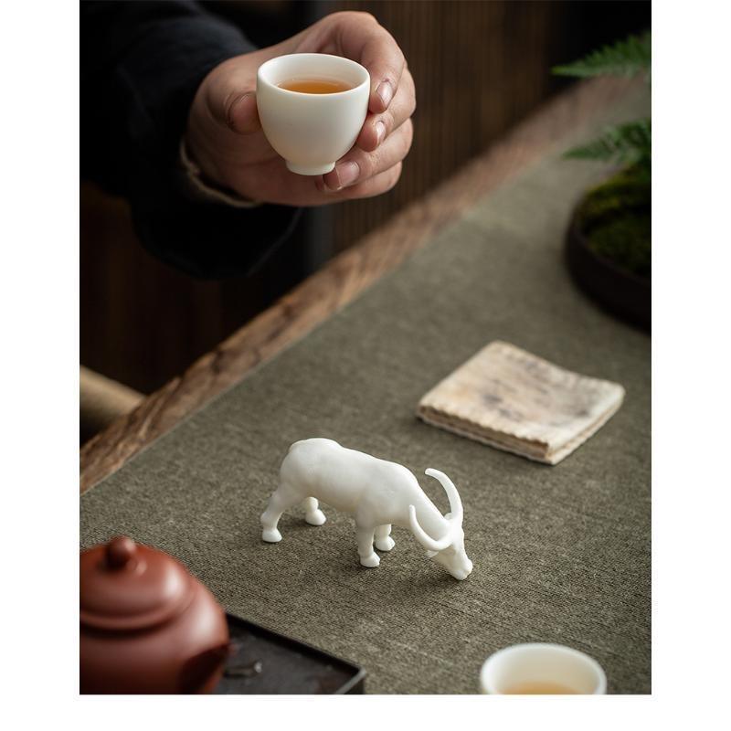 Tea pet ornaments, fine products, can be kept, Dehua white porcelain zodiac ox ceramic creative office tea table tea tray decorations