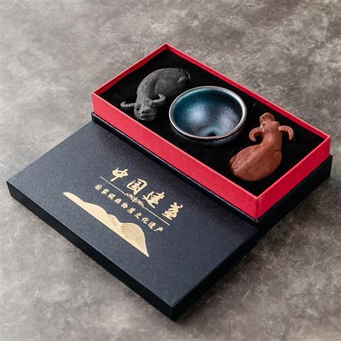 Shengyao purple sand ox turning the world Jianyang Jianzhan tea cup Baihuamu tea pet ornaments gift boutique iron tire oil drop