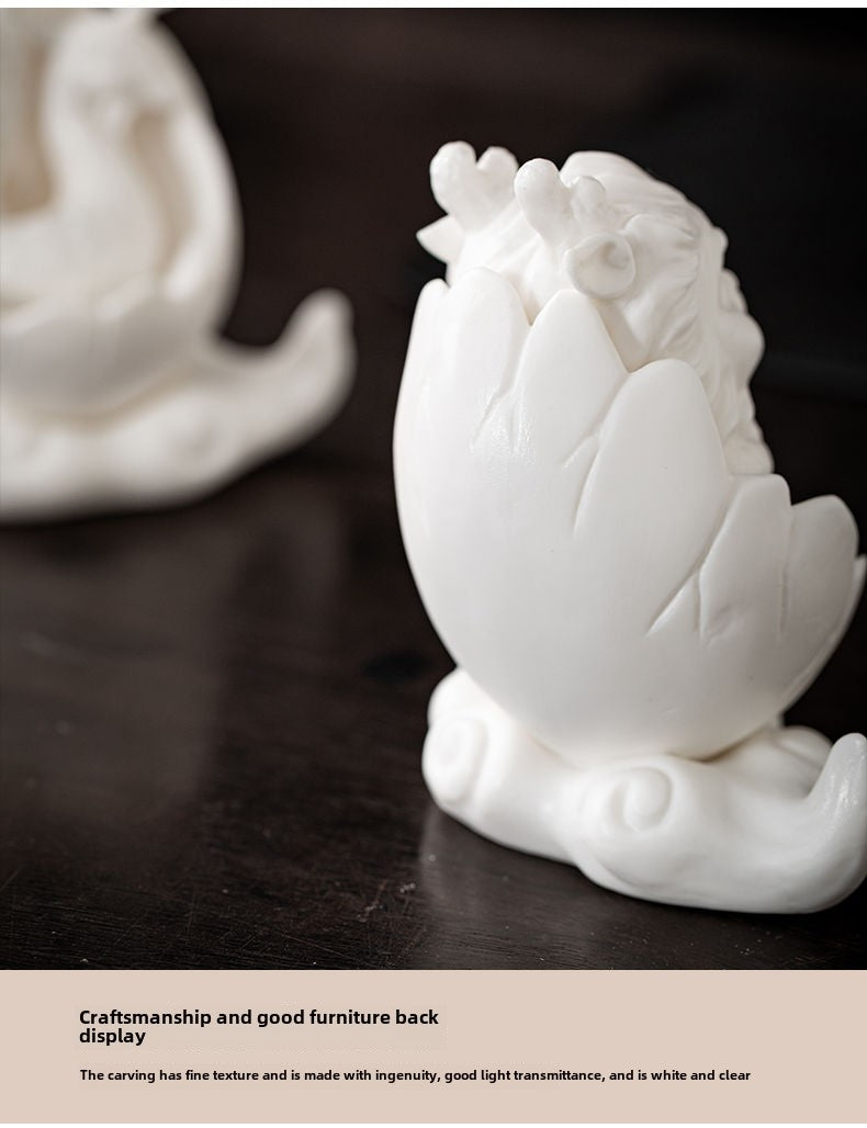 Dehua white porcelain peacock unicorn ornaments ceramic fortune-bringing crafts to resolve the living room desktop Chinese tea pet