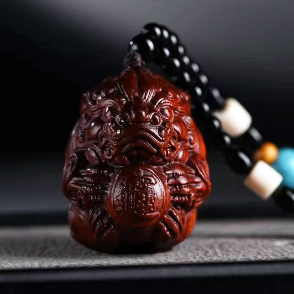 Thuja wood carving Pixiu holding a ball, which can answer any request and bring wealth and fortune, red sandalwood solid wood Pixiu massage ball, high-end hand-held piece