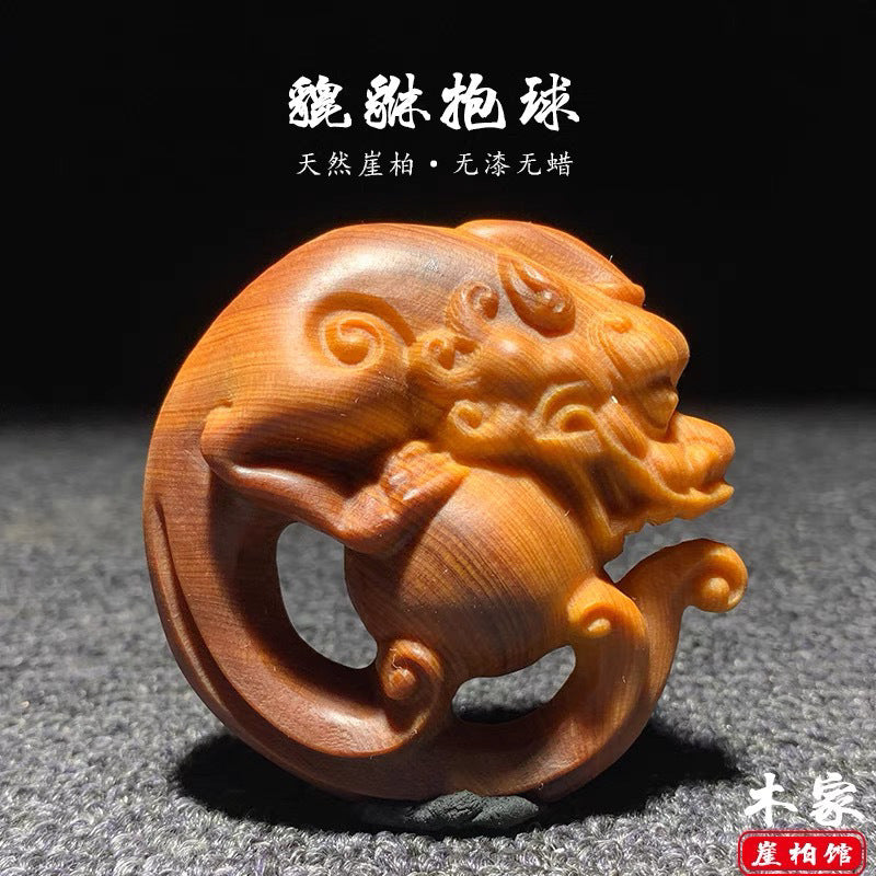 Thuja wood high oil aged material carved Pixiu holding a ball table for portable play and hand-held home decoration