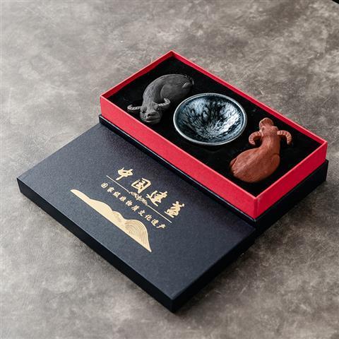 Shengyao purple sand ox turning the world Jianyang Jianzhan tea cup Baihuamu tea pet ornaments gift boutique iron tire oil drop