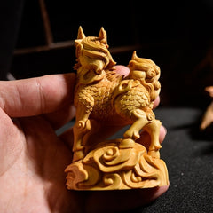 Taihang cliff cypress boxwood carving unicorn hand-held small desktop ornaments creative tea pet office fortune wood carving gift