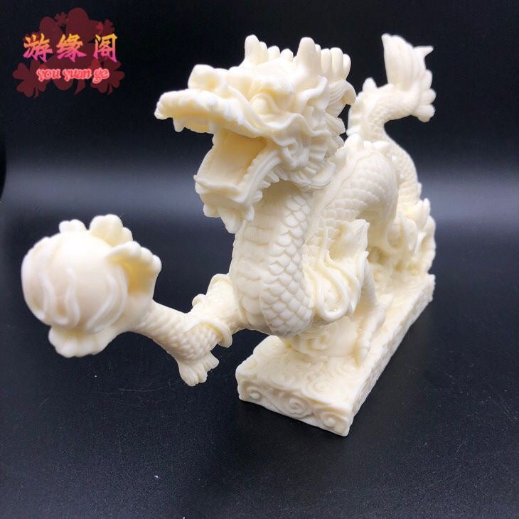 Ivory dragon auspicious dragon spitting beads ornaments zodiac dragon crafts antique shelf landscape dragon flying around the world gift decoration