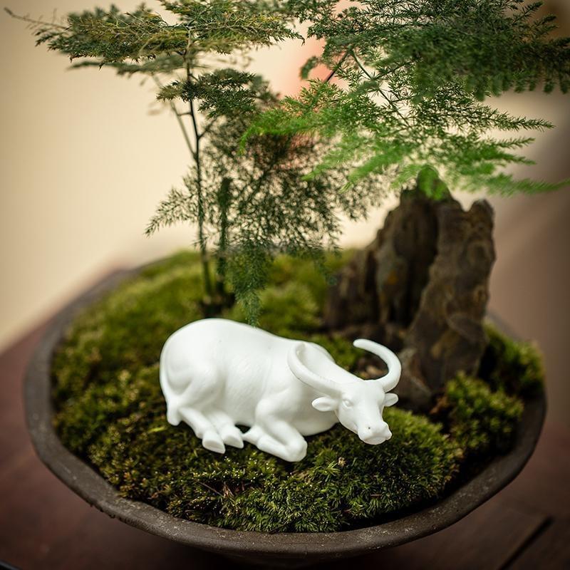 Tea pet ornaments, fine products, can be kept, Dehua white porcelain zodiac ox ceramic creative office tea table tea tray decorations