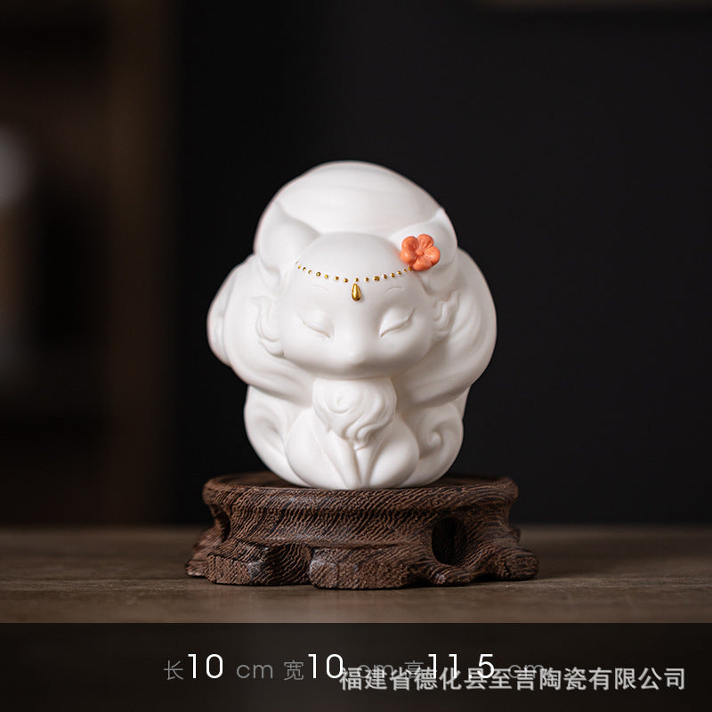 Dehua preferred cute white porcelain nine-tailed fox small ornaments tea ceremony tea table tea play tea pet ornaments desktop can be raised decoration