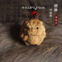 Thuja wood carving Pixiu holding a ball, which can answer any request and bring wealth and fortune, red sandalwood solid wood Pixiu massage ball, high-end hand-held piece