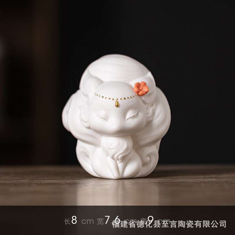 Dehua preferred cute white porcelain nine-tailed fox small ornaments tea ceremony tea table tea play tea pet ornaments desktop can be raised decoration