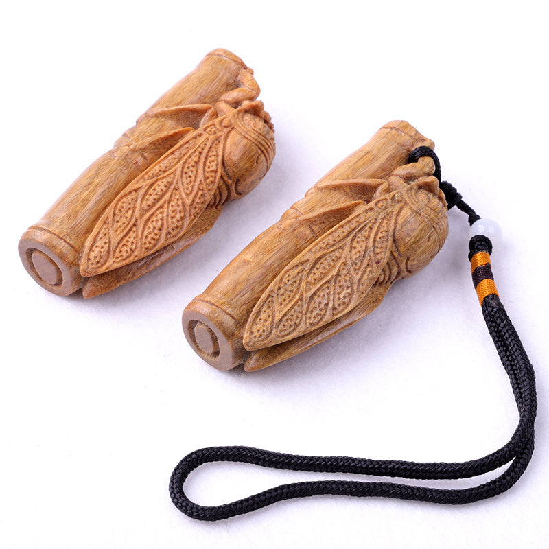 Green sandalwood hand-held pieces are amazing. Hand-carved wood crafts. Golden cicada hugging bamboo. Wooden bamboo summer cicada playthings