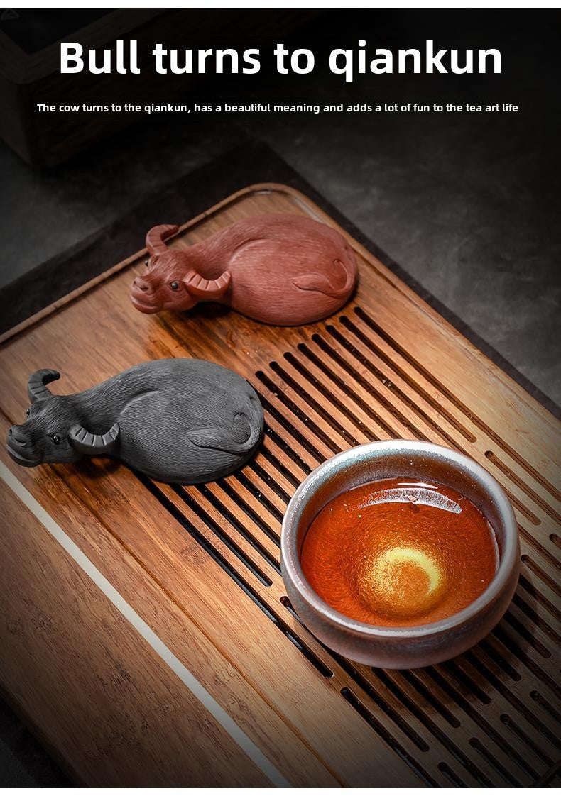 Shengyao purple sand ox turning the world Jianyang Jianzhan tea cup Baihuamu tea pet ornaments gift boutique iron tire oil drop