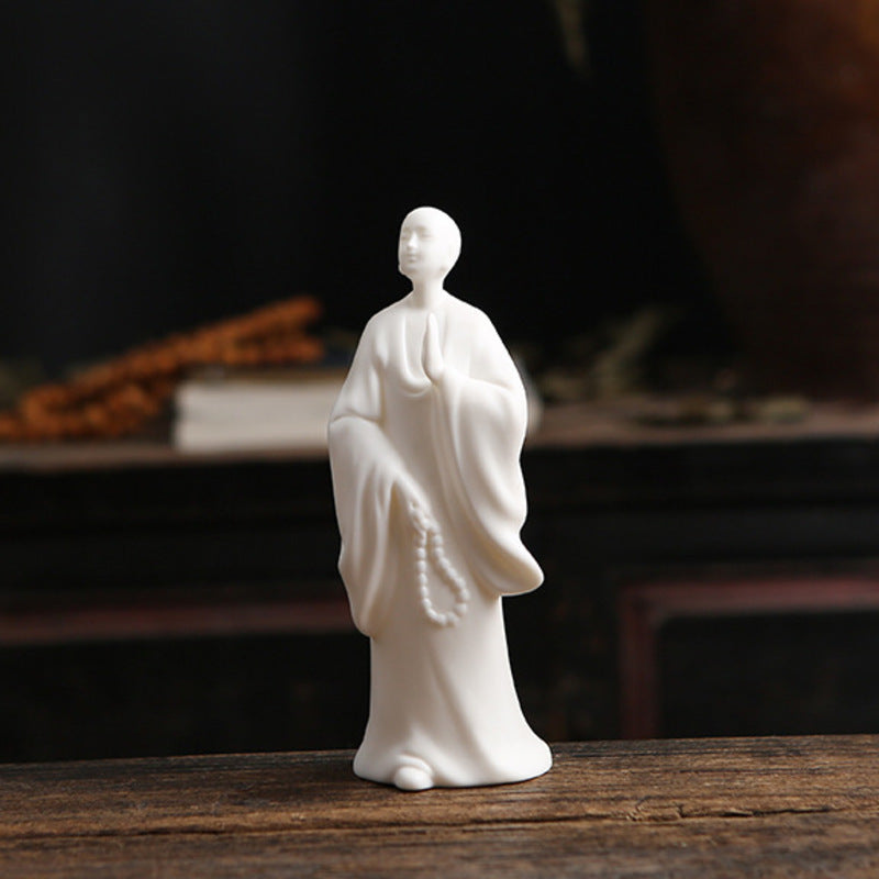 Mutton-fat jade creative tea pet ornaments ceramic Zen ornaments living room tea ceremony accessories decoration new Chinese style white porcelain figures