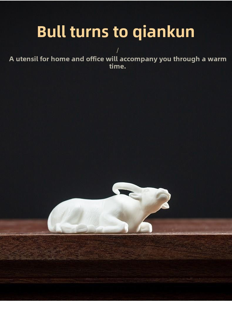 Tea pet ornaments, fine products, can be kept, Dehua white porcelain zodiac ox ceramic creative office tea table tea tray decorations