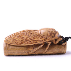 Green sandalwood hand-held pieces are amazing. Hand-carved wood crafts. Golden cicada hugging bamboo. Wooden bamboo summer cicada playthings