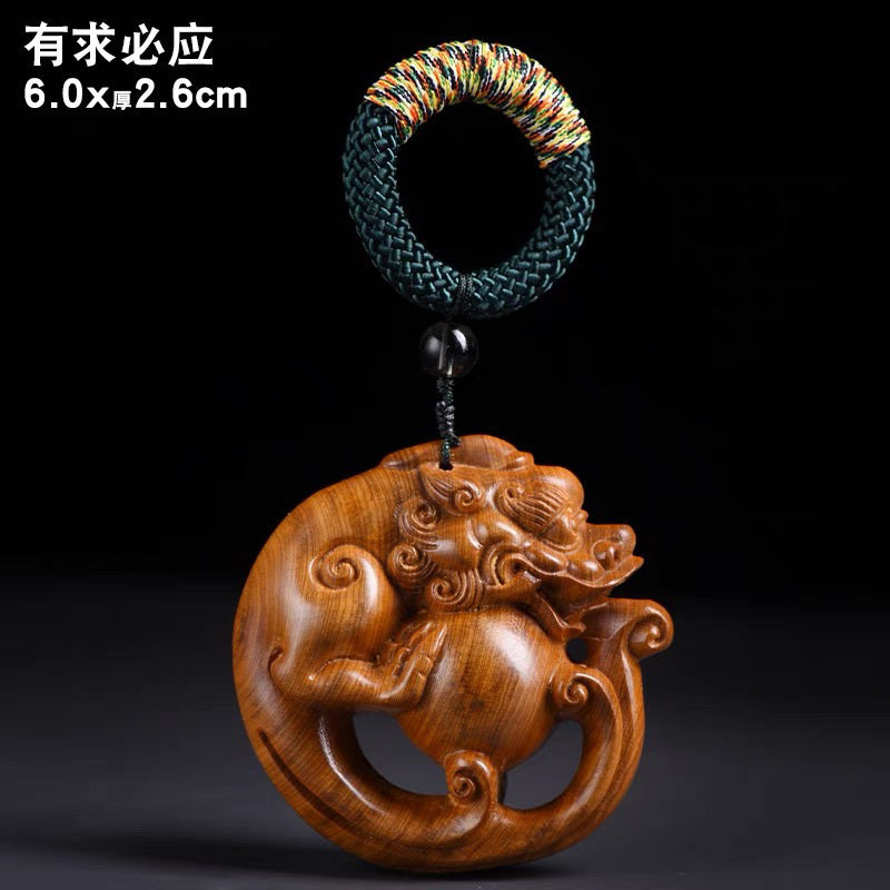 Thuja wood high oil aged material carved Pixiu holding a ball table for portable play and hand-held home decoration