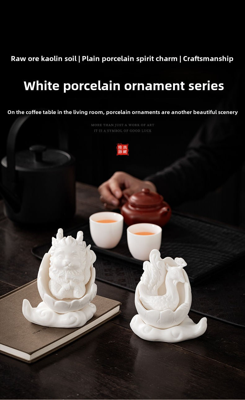 Dehua white porcelain peacock unicorn ornaments ceramic fortune-bringing crafts to resolve the living room desktop Chinese tea pet