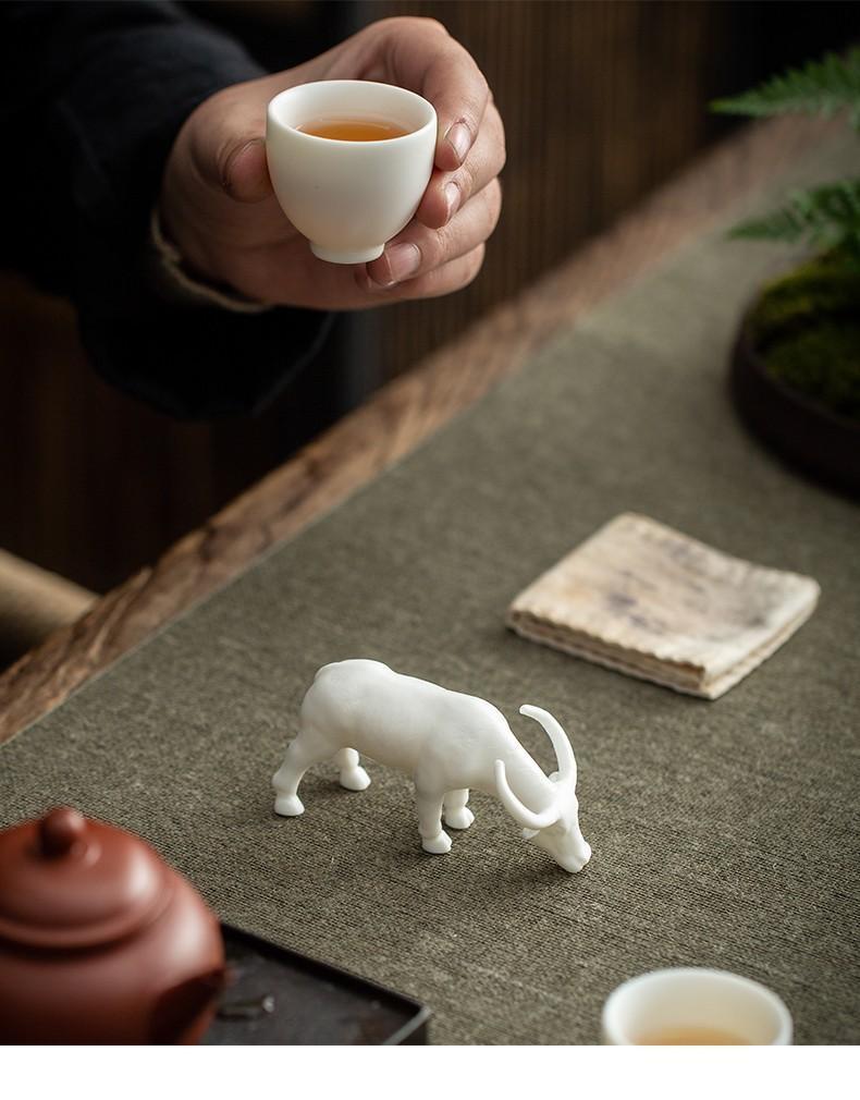 Tea pet ornaments, fine products, can be kept, Dehua white porcelain zodiac ox ceramic creative office tea table tea tray decorations