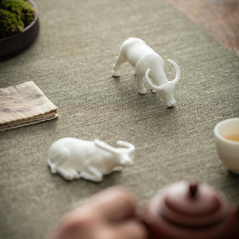 Tea pet ornaments, fine products, can be kept, Dehua white porcelain zodiac ox ceramic creative office tea table tea tray decorations